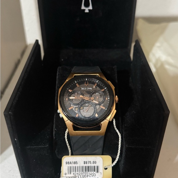 at Bulova Luxurious Black and Gold Timepiece